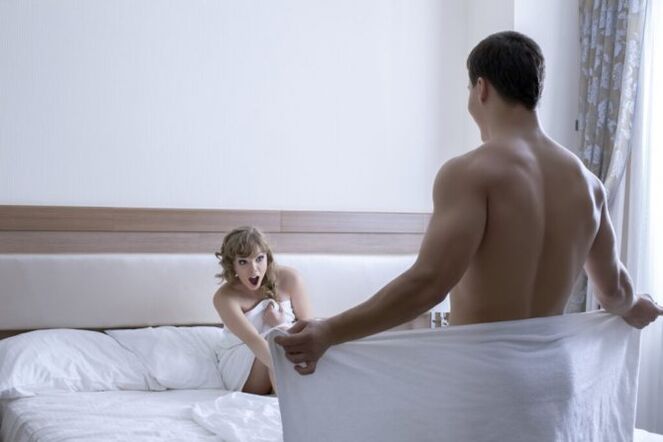 a woman admires the size of the penis